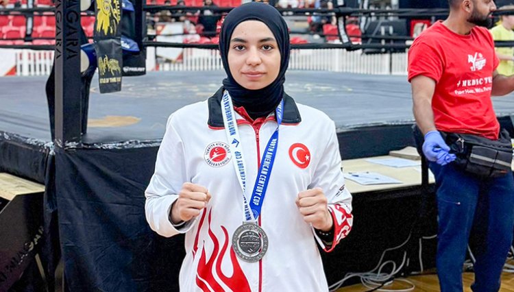 İKİ MADALYA İLE DÖNDÜ
